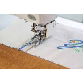 Even feed foot open with quilt guide